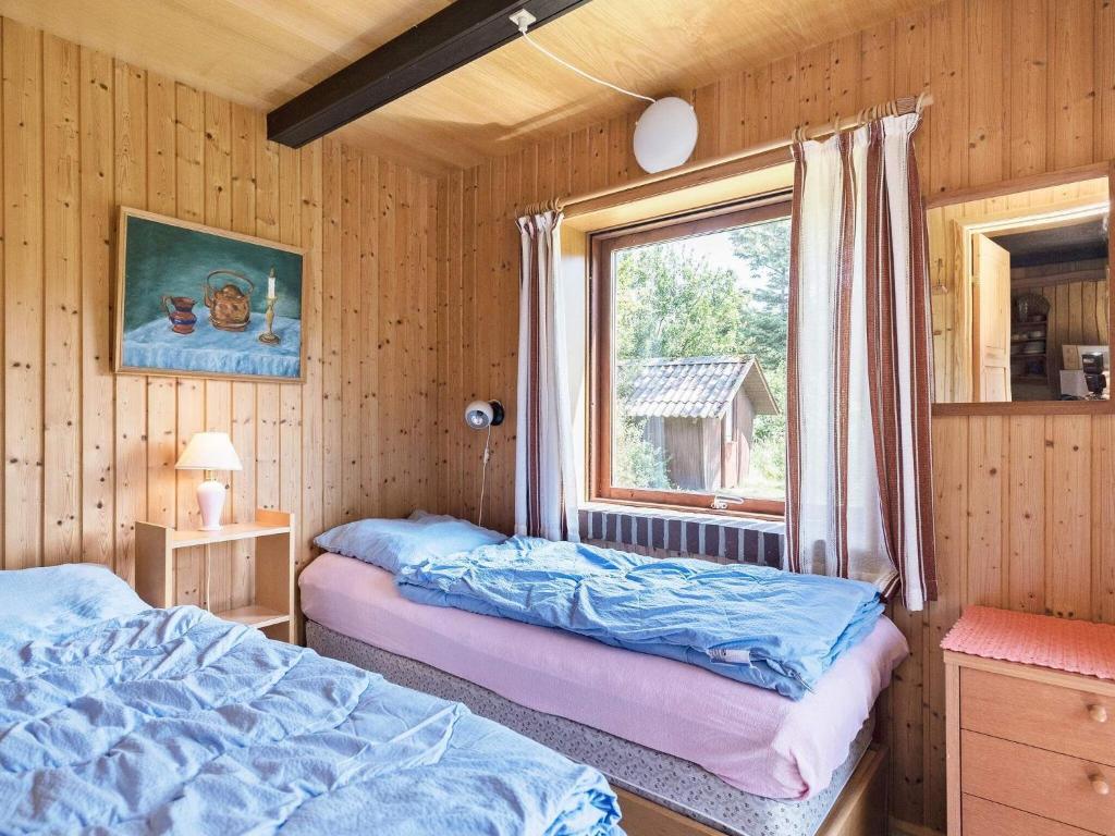 Postel nebo postele na pokoji v ubytování Secluded Retreat in Blavand - By Traum Ferienwohnungen
