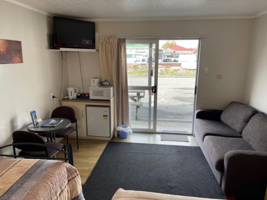Kuchyň nebo kuchyňský kout v ubytování Raymar Motor Inn