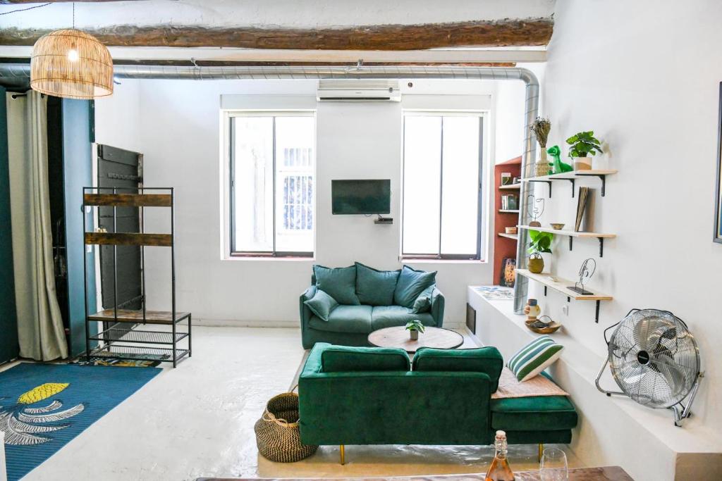 Televízia a/alebo spoločenská miestnosť v ubytovaní Le Fortia II - Appartement Vieux-Port