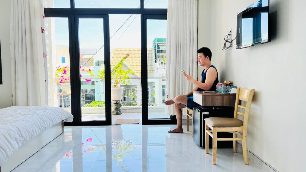 TV a/nebo společenská místnost v ubytování Cô Ba Homestay