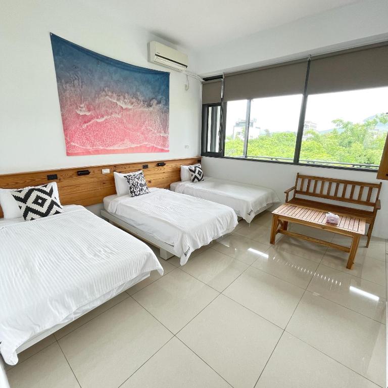 Postel nebo postele na pokoji v ubytování Imanuel Surfing B&B No 2