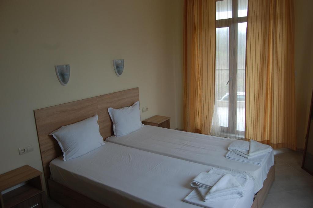 Postel nebo postele na pokoji v ubytování Renta BG Apartments in Tsarevo