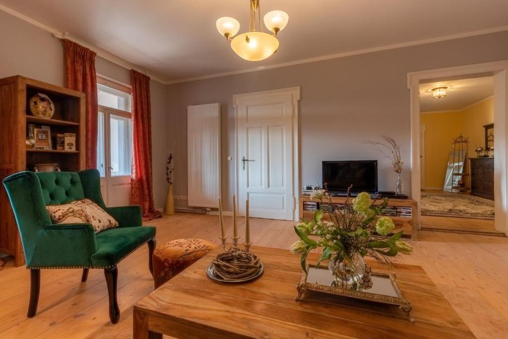TV a/nebo společenská místnost v ubytování Ferienwohnung Anno1898 Zittau