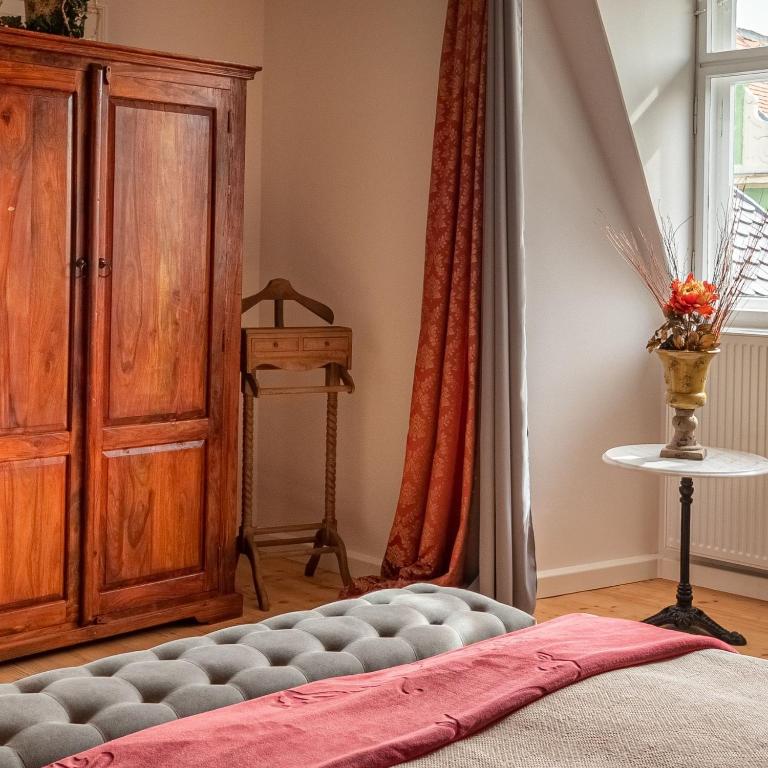 Postel nebo postele na pokoji v ubytování Ferienwohnung Anno1898 Zittau