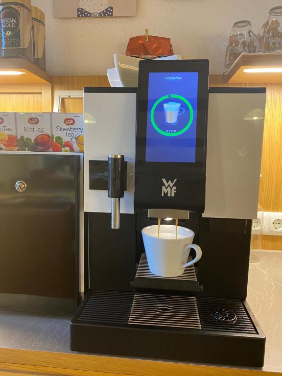 Kuchyň nebo kuchyňský kout v ubytování Hotel Garni Enzian