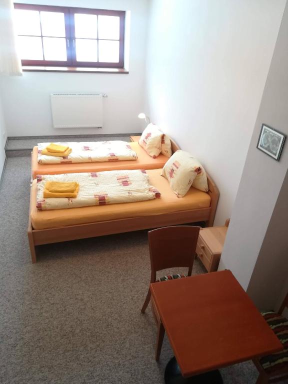 Postel nebo postele na pokoji v ubytování apartmány Zak