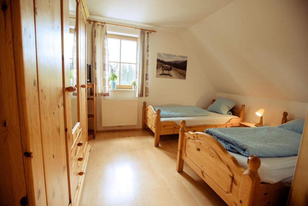 Postel nebo postele na pokoji v ubytování Gamsberg Hütte