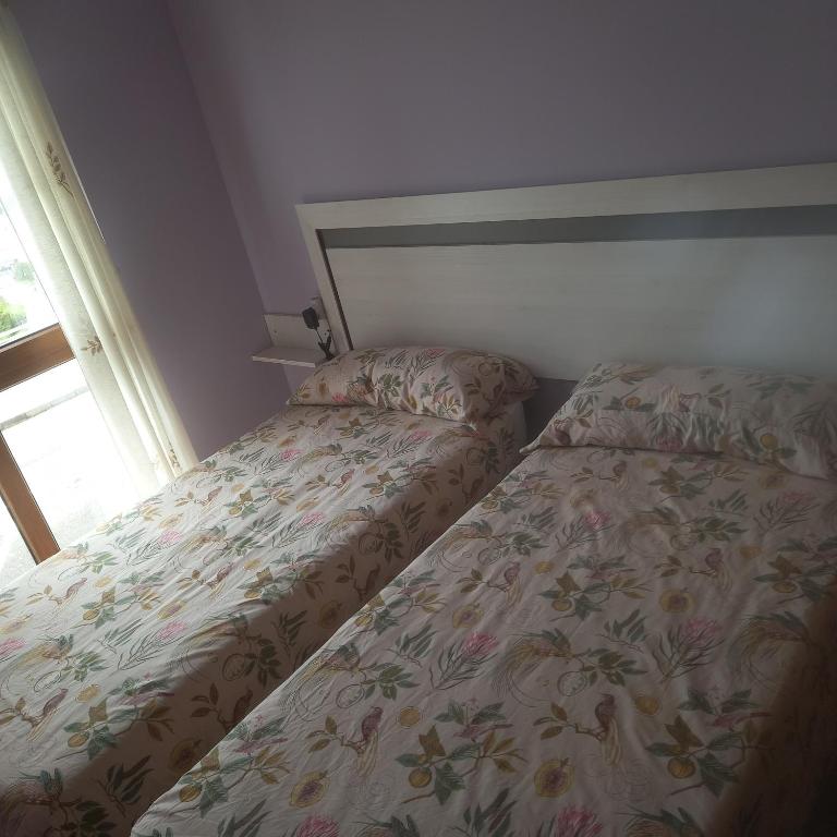 Postel nebo postele na pokoji v ubytování LUARCAPLAYA APARTAMENTO Plazas de garaje incluidas