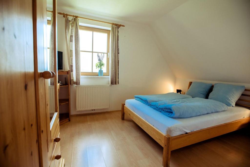 Postel nebo postele na pokoji v ubytování Gamsberg Hütte