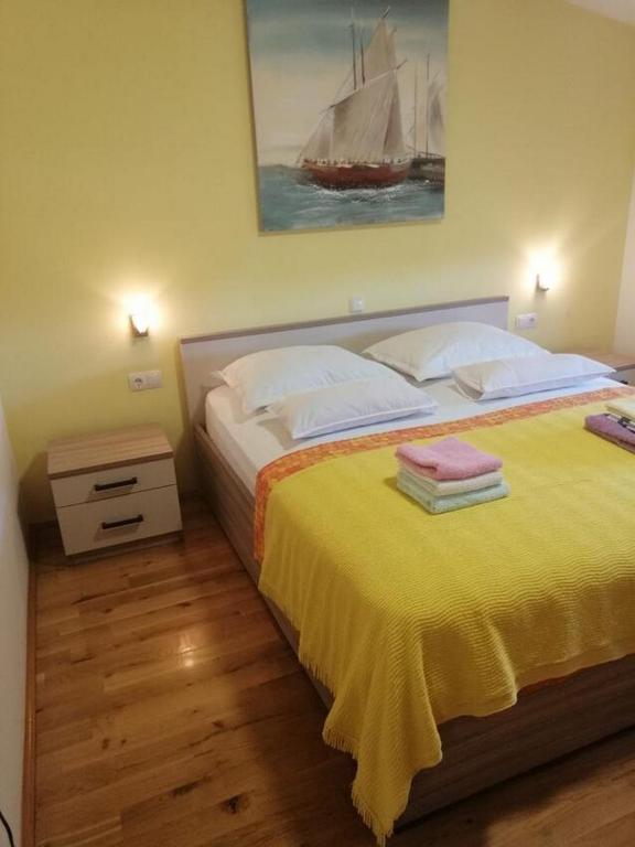 Posteľ alebo postele v izbe v ubytovaní Apartment Spalato