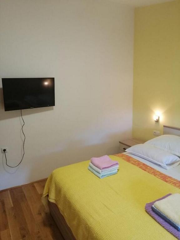 Posteľ alebo postele v izbe v ubytovaní Apartment Spalato