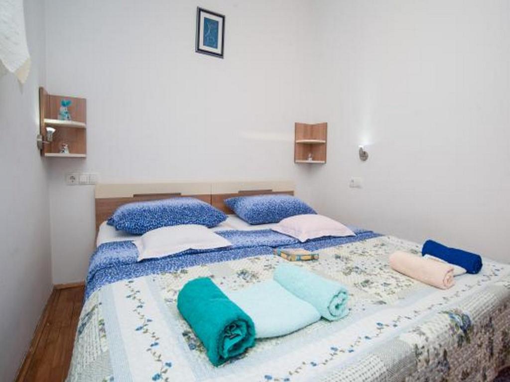 Posteľ alebo postele v izbe v ubytovaní Apartment Spalato