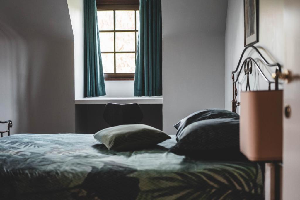 Postel nebo postele na pokoji v ubytování Guesthouse Ter Linden