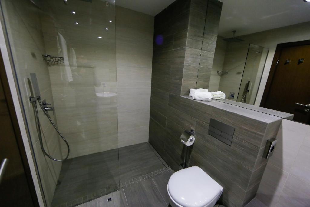 Koupelna v ubytování Uva Nestum Wine & SPA