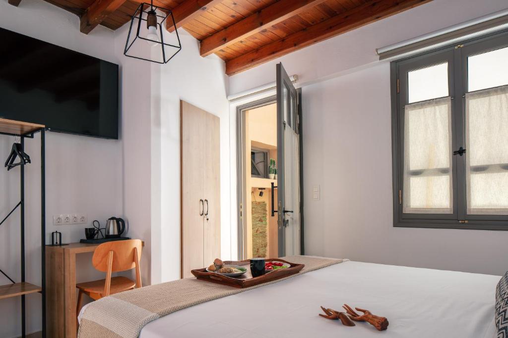 Postel nebo postele na pokoji v ubytování Gateway Suites