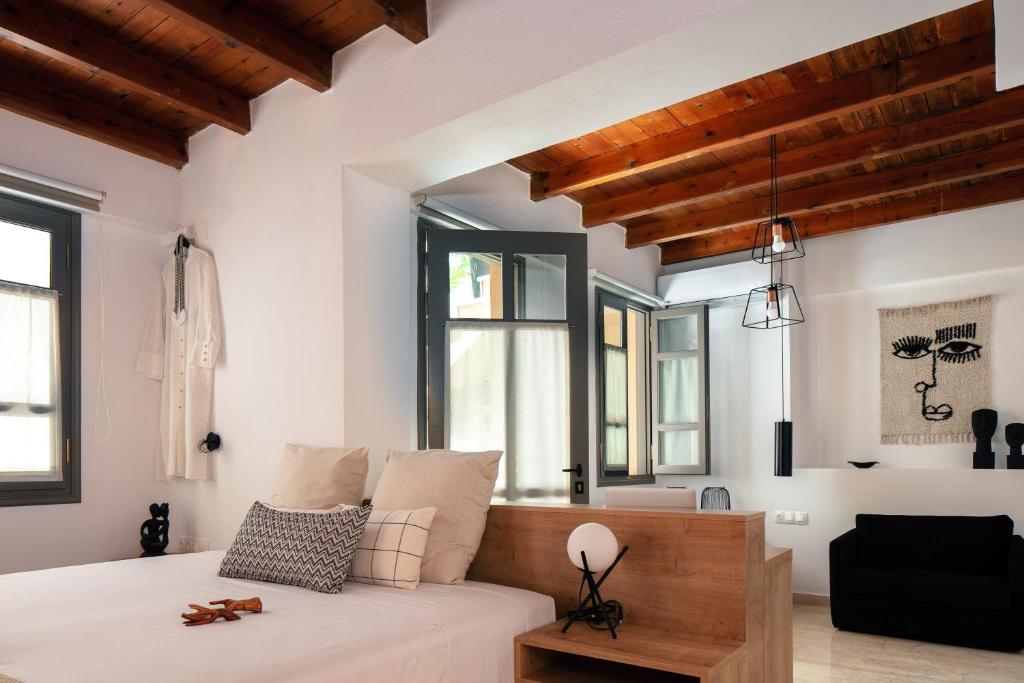 Postel nebo postele na pokoji v ubytování Gateway Suites