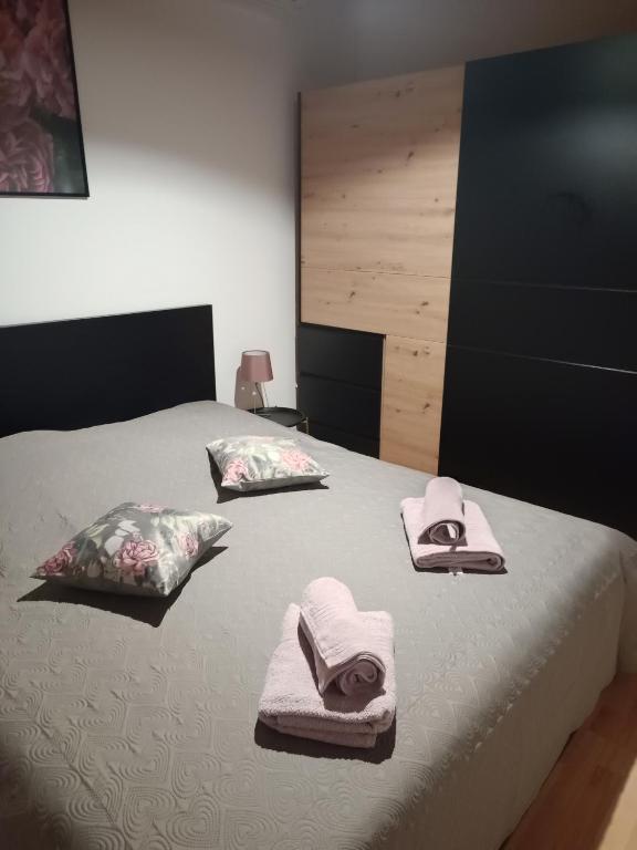 Łóżko lub łóżka w pokoju w obiekcie Apartments Bosnic