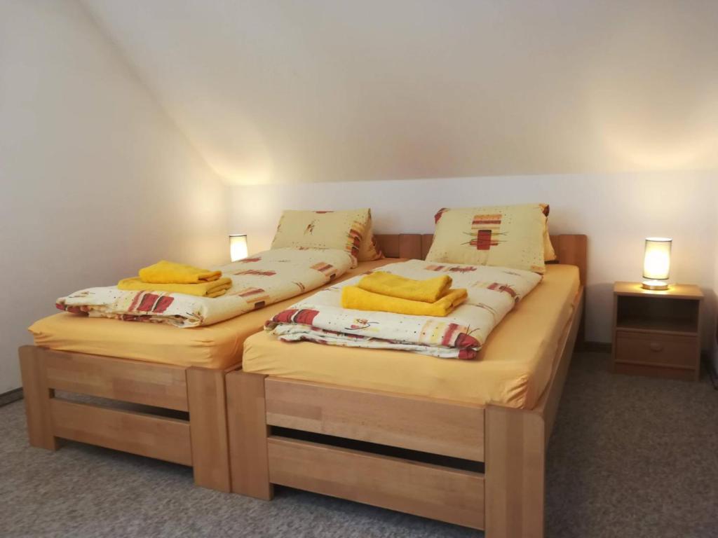 Postel nebo postele na pokoji v ubytování apartmány Zak
