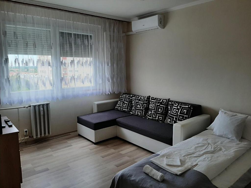 Posezení v ubytování Sunnyrise Apartman