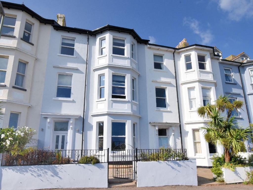 an image of a large white house at 7 Seafield Road in Seaton