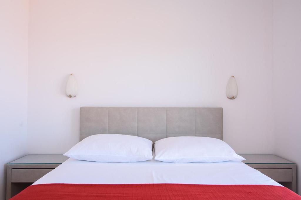 Posteľ alebo postele v izbe v ubytovaní Apartments Mastelic
