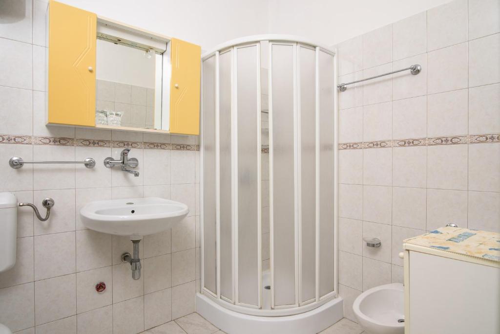 Kúpeľňa v ubytovaní Apartments Mastelic