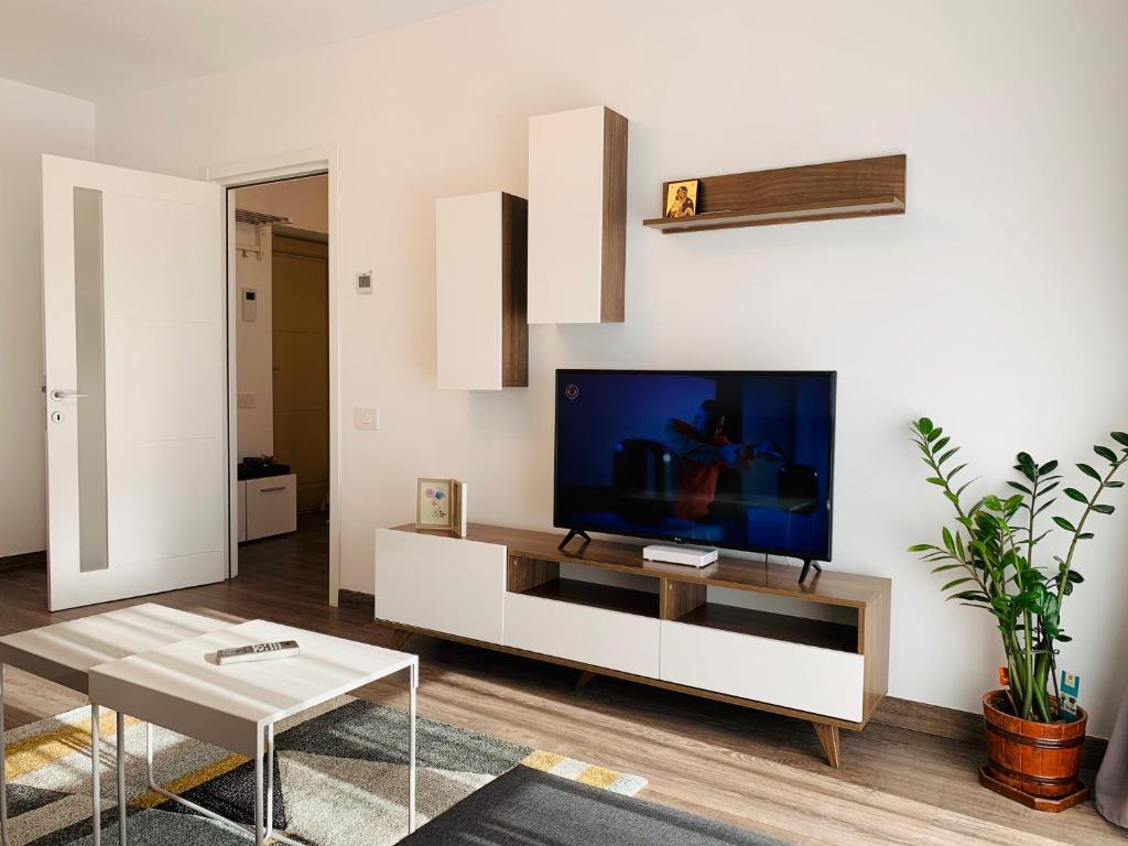 Newton luxury apartment tesisinde bir televizyon ve/veya eğlence merkezi