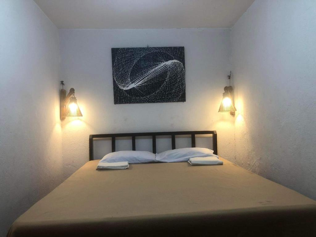 Postel nebo postele na pokoji v ubytování Mylene Room Rental