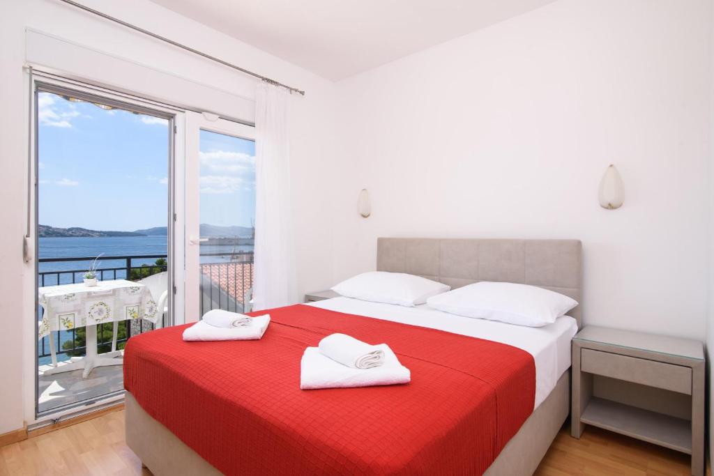 Posteľ alebo postele v izbe v ubytovaní Apartments Mastelic