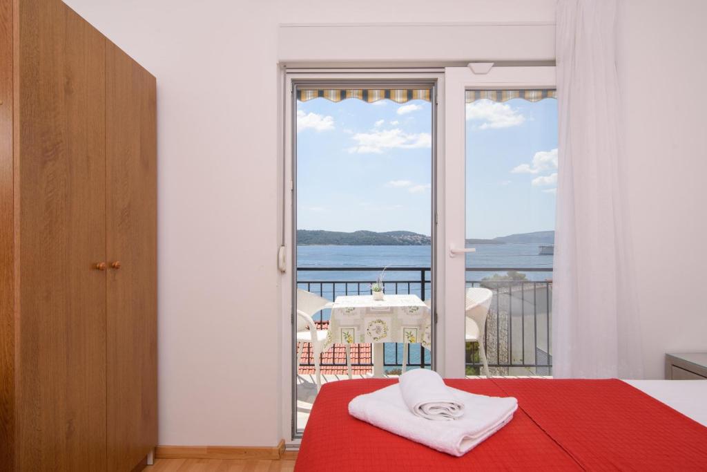 Posteľ alebo postele v izbe v ubytovaní Apartments Mastelic