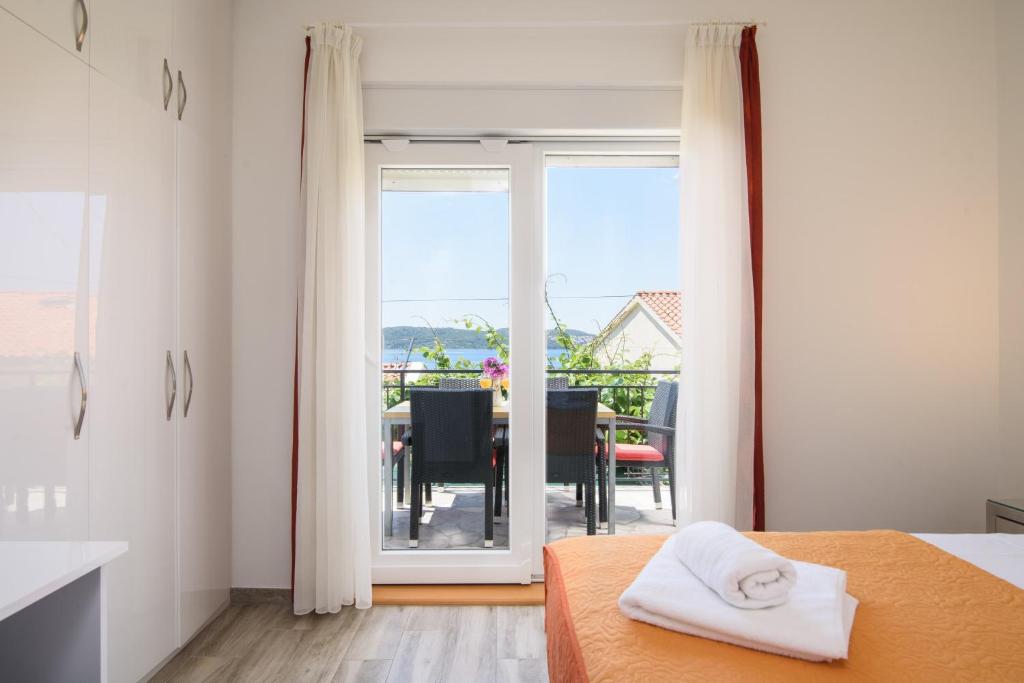 Posteľ alebo postele v izbe v ubytovaní Apartments Mastelic