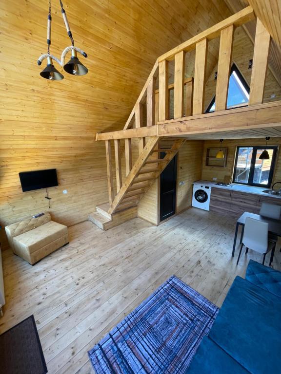 TV o dispositivi per l'intrattenimento presso Guesthouse Elli & Cottages