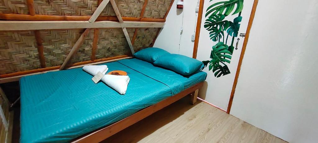 Postel nebo postele na pokoji v ubytování RC Hutspot Tourist Inn