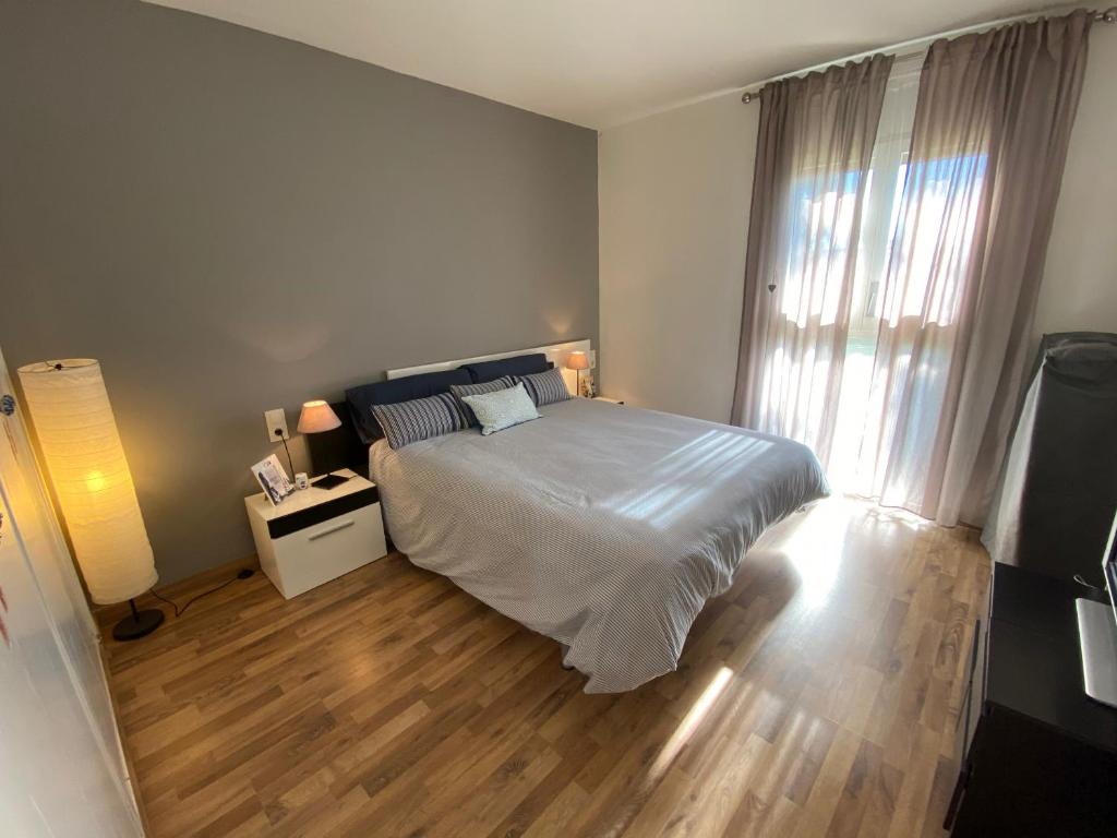 Postel nebo postele na pokoji v ubytování Apartamento Mas Pinell B4