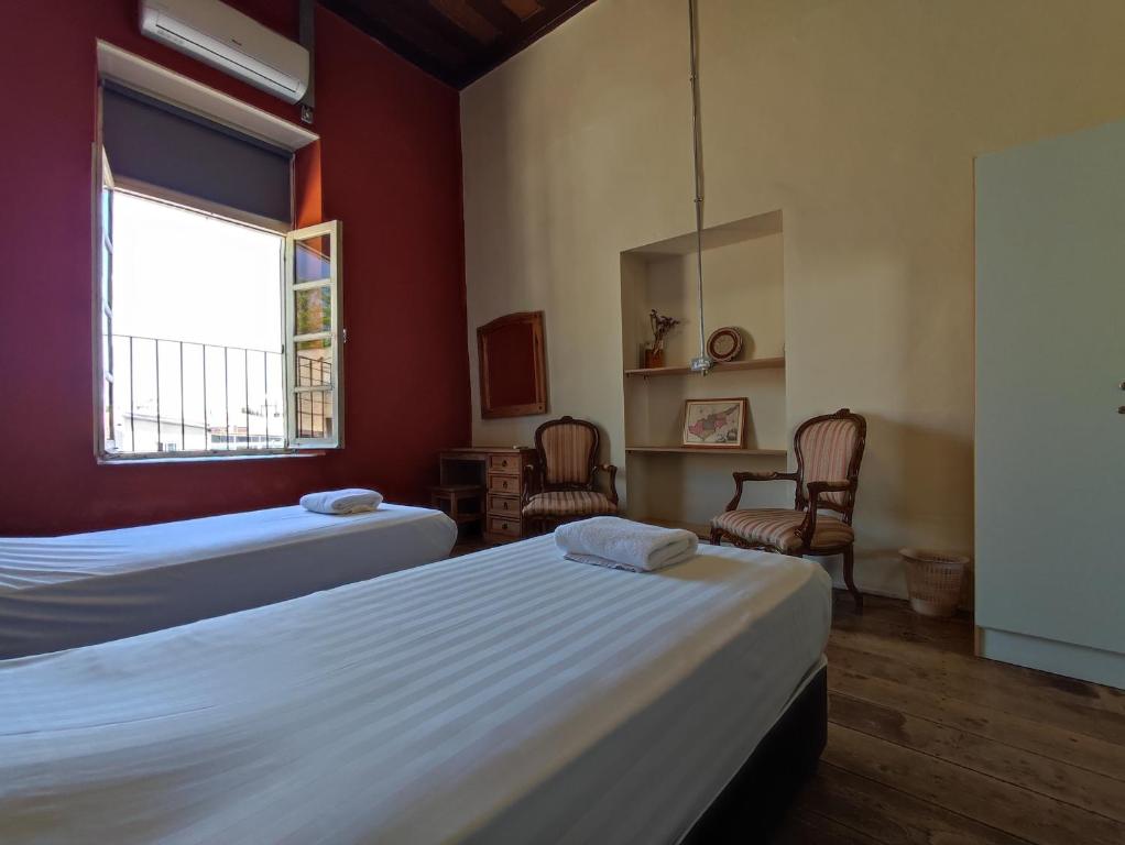Postel nebo postele na pokoji v ubytování Le Mat Hostel