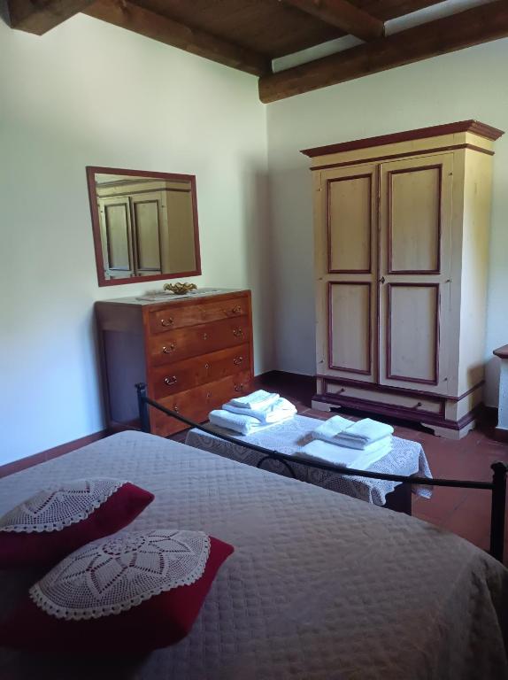 Postel nebo postele na pokoji v ubytování AgriHouse Orvieto