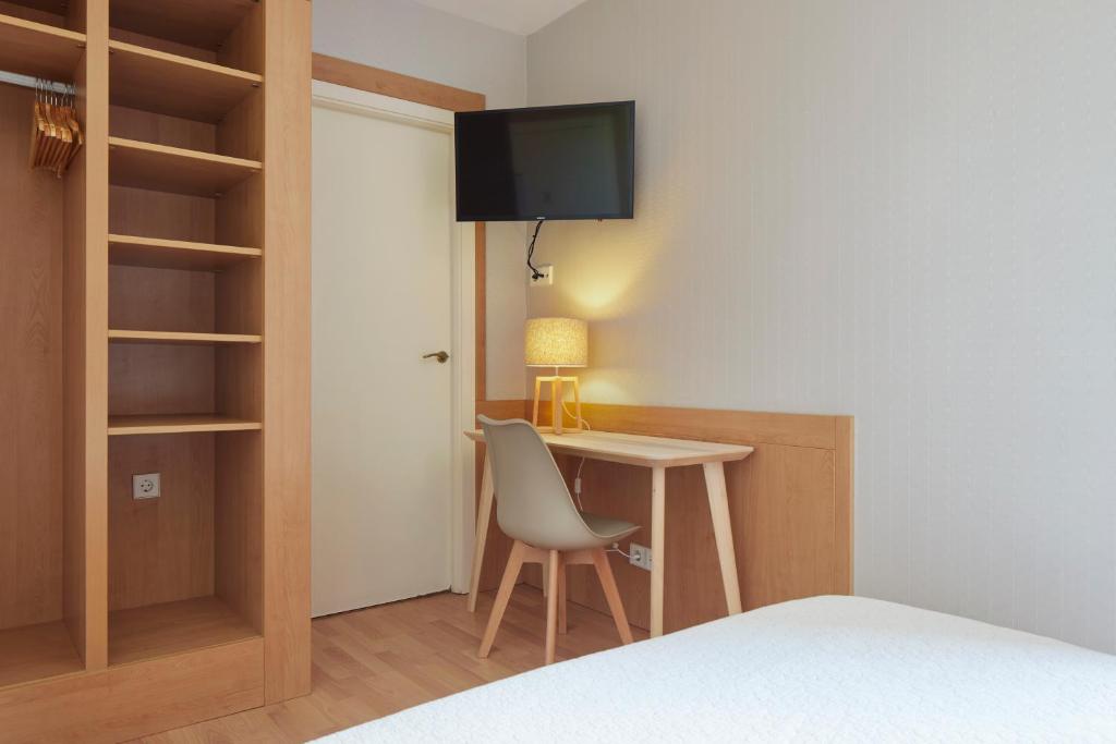 Posteľ alebo postele v izbe v ubytovaní Hotel Berri Versalles