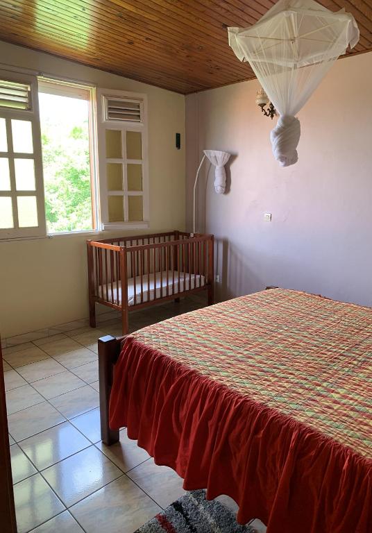 Postel nebo postele na pokoji v ubytování Hébergement mouchas F4 - dans Villa les Polycias
