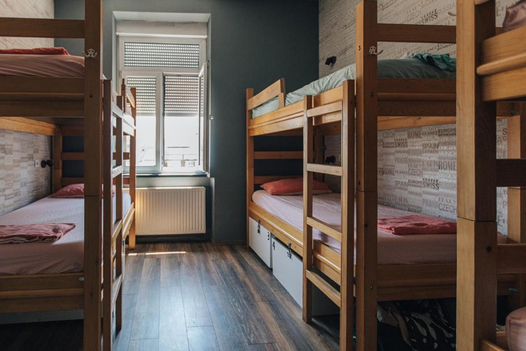 Postel nebo postele na pokoji v ubytování Palmers Lodge Hostel