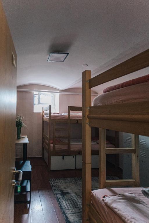Postel nebo postele na pokoji v ubytování Palmers Lodge Hostel