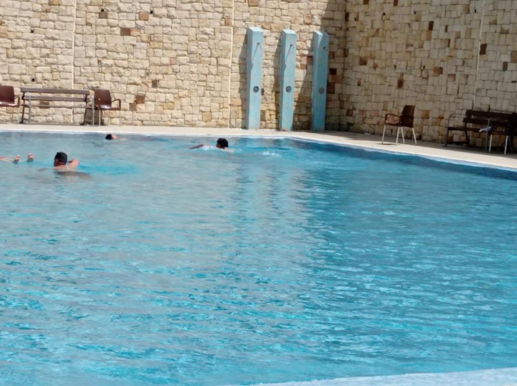 Bazén v ubytování Résidence neuve avec piscine M’diq nebo v jeho okolí