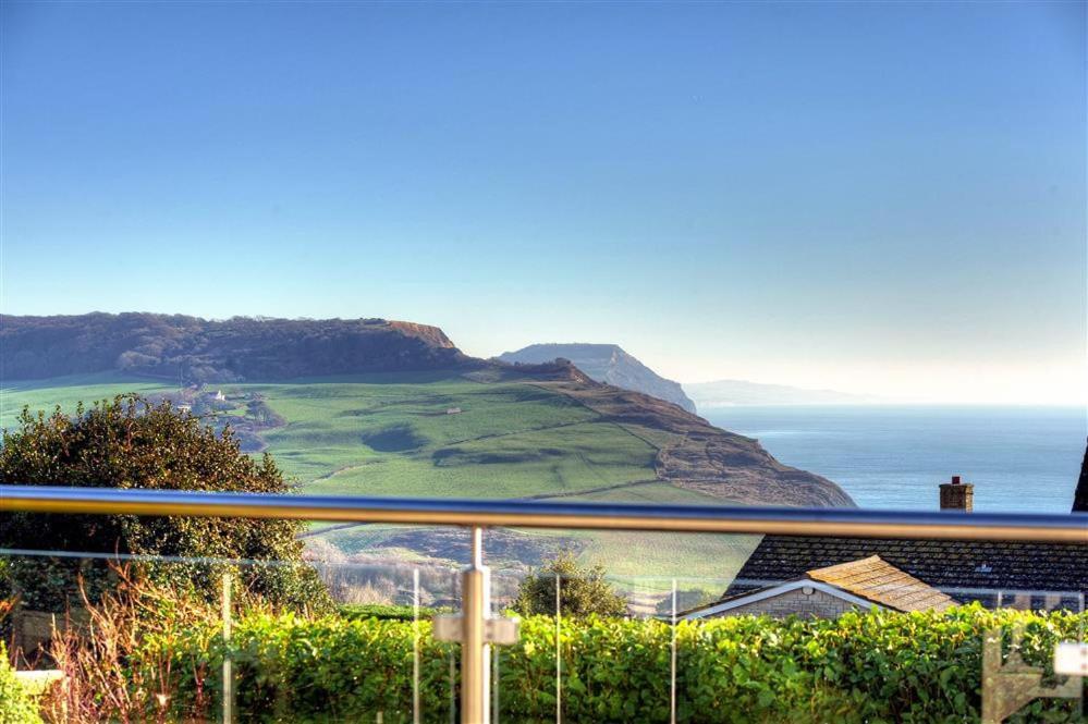 a view of the ocean from a house at Pendower in Charmouth