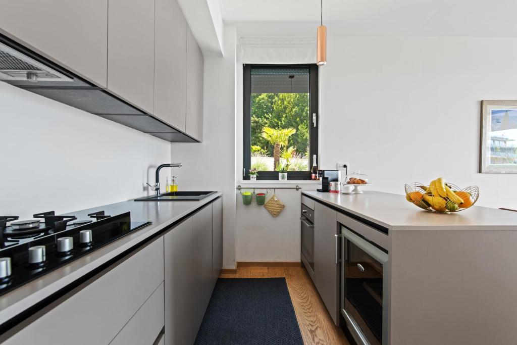 Kuchyňa alebo kuchynka v ubytovaní Apartments Villa Zara