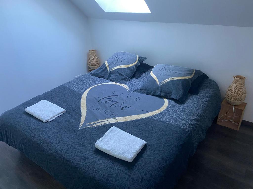 Postel nebo postele na pokoji v ubytování Chez Fabien sourzat