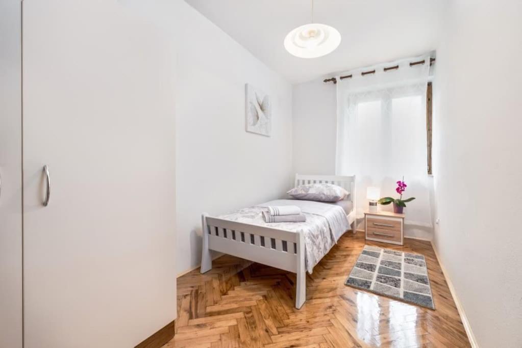 Posteľ alebo postele v izbe v ubytovaní Apartman Aspalathos