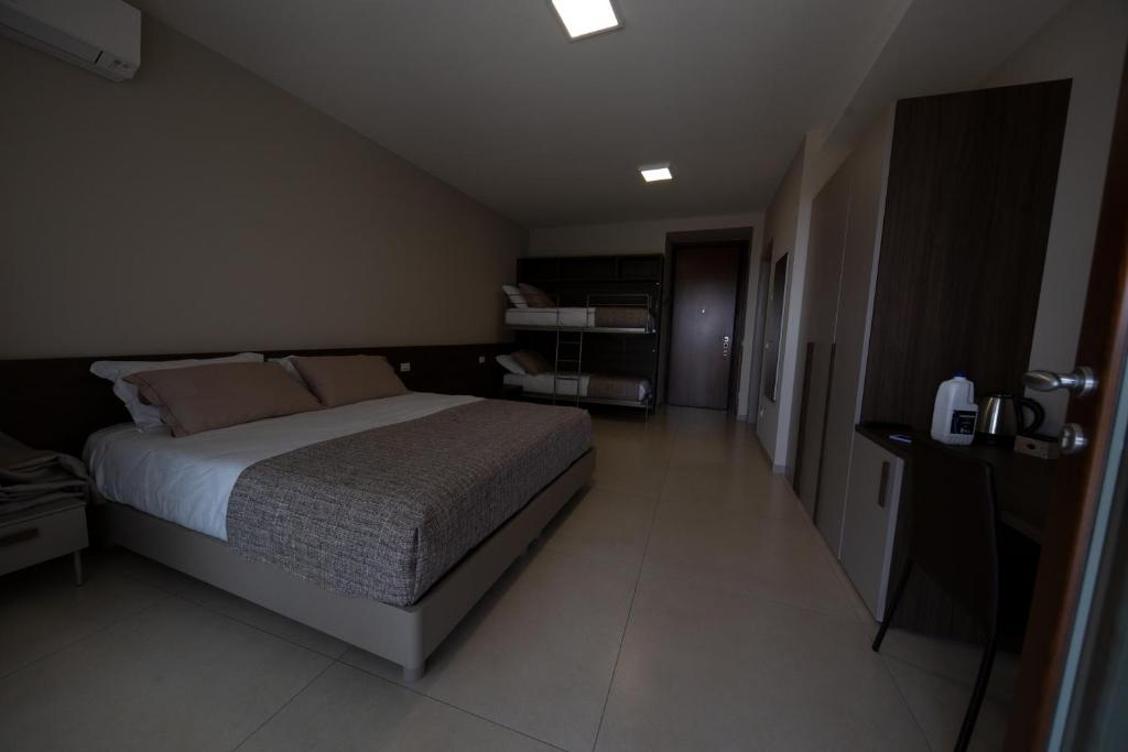 Postel nebo postele na pokoji v ubytování B&B” La Tezza”