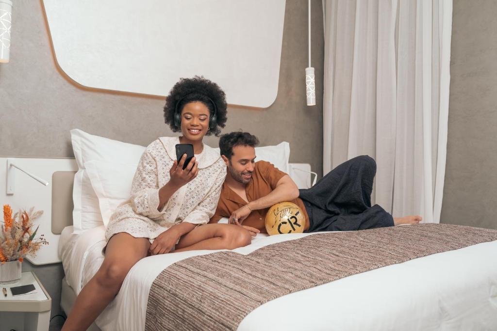 Postel nebo postele na pokoji v ubytování Pestana CR7 Marrakech