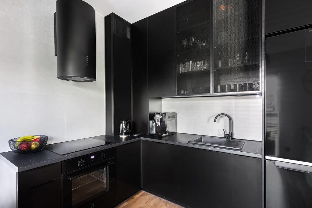 Kuchyňa alebo kuchynka v ubytovaní Victoria Apartment