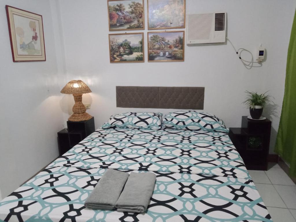 מיטה או מיטות בחדר ב-Dalindas Homestay