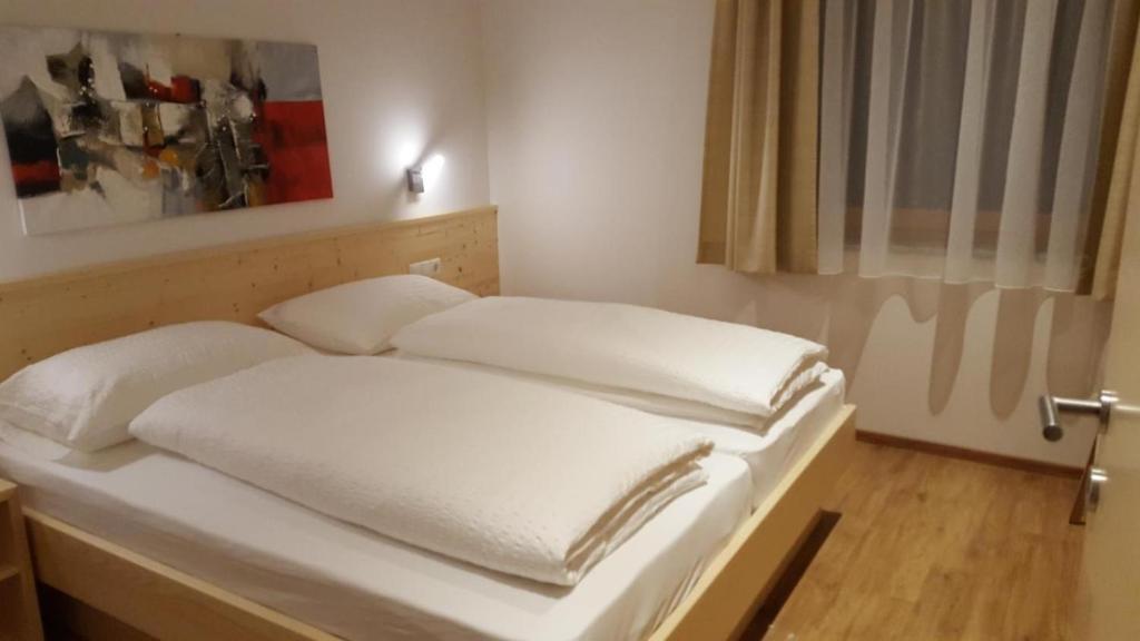 Posteľ alebo postele v izbe v ubytovaní Residence Klementhof 2